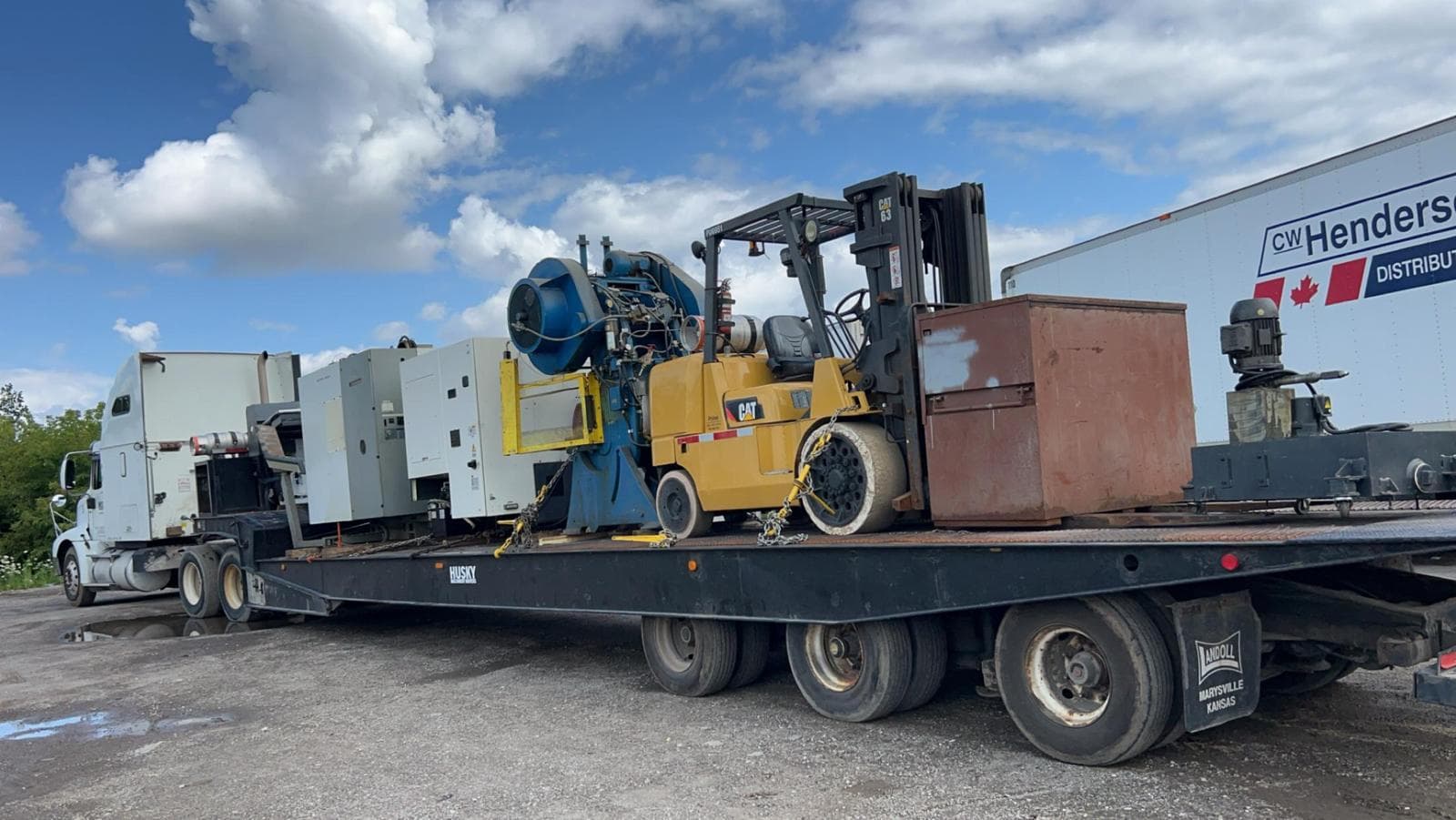 Professional transportation services by Husky Machinery Movers Ontario